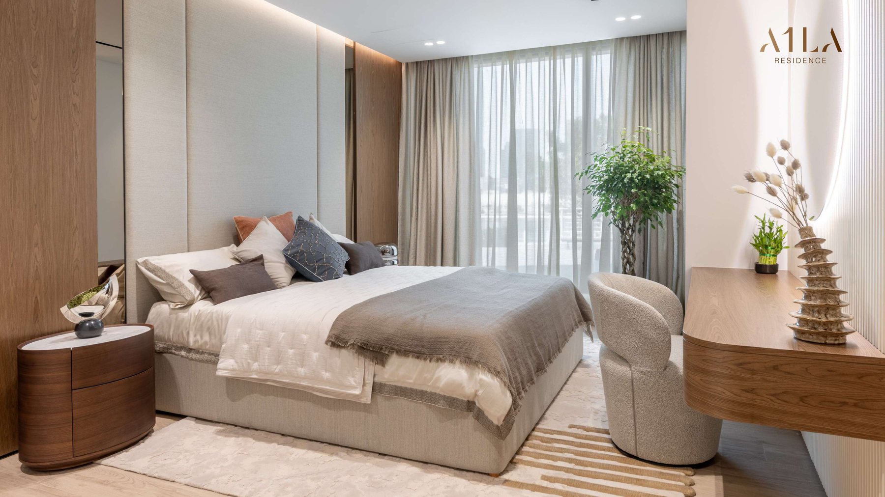 A bedroom at A1LA Residence opening onto a balcony