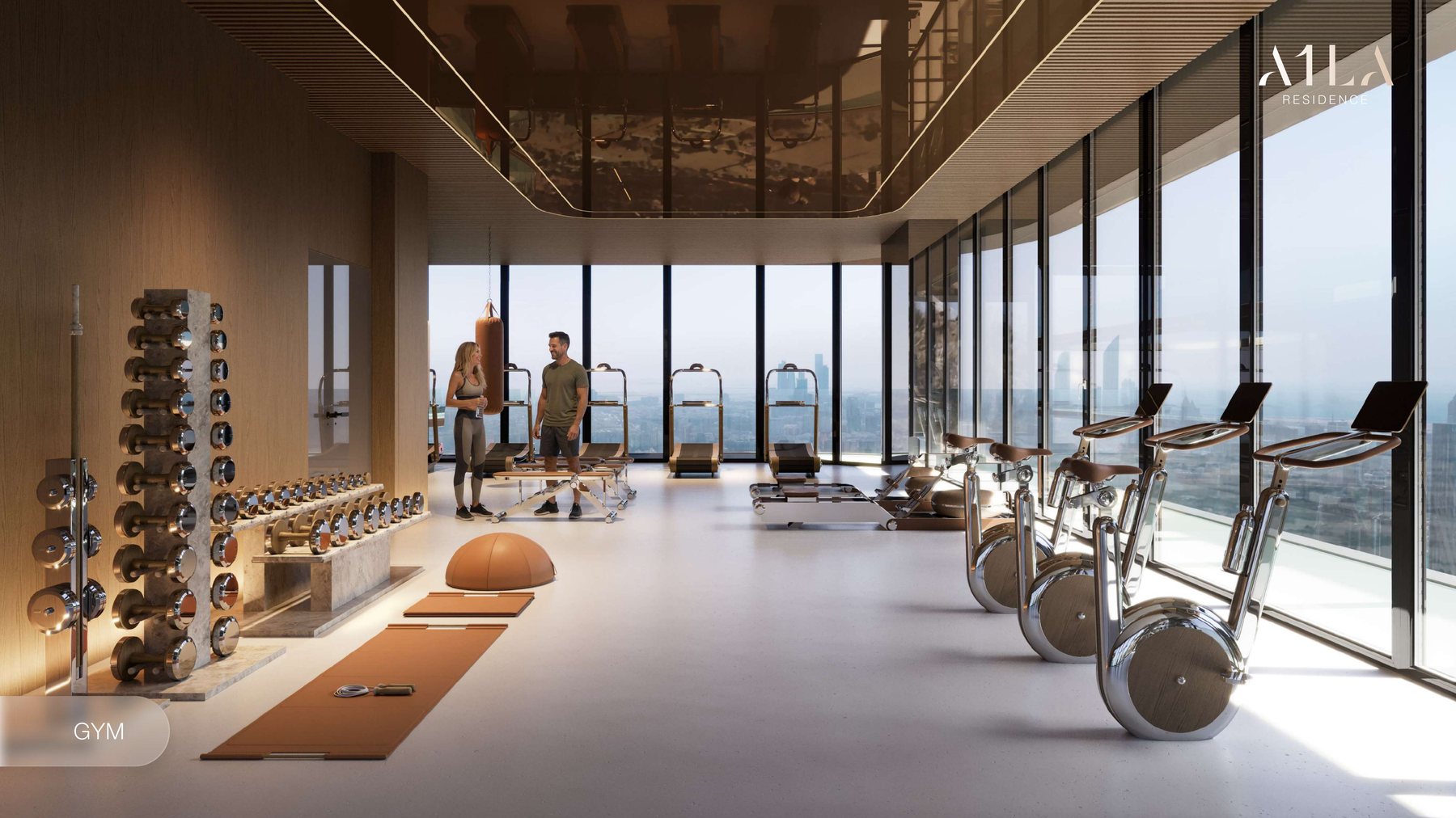 The gym at A1LA Residence, full-height glazing along the training floor