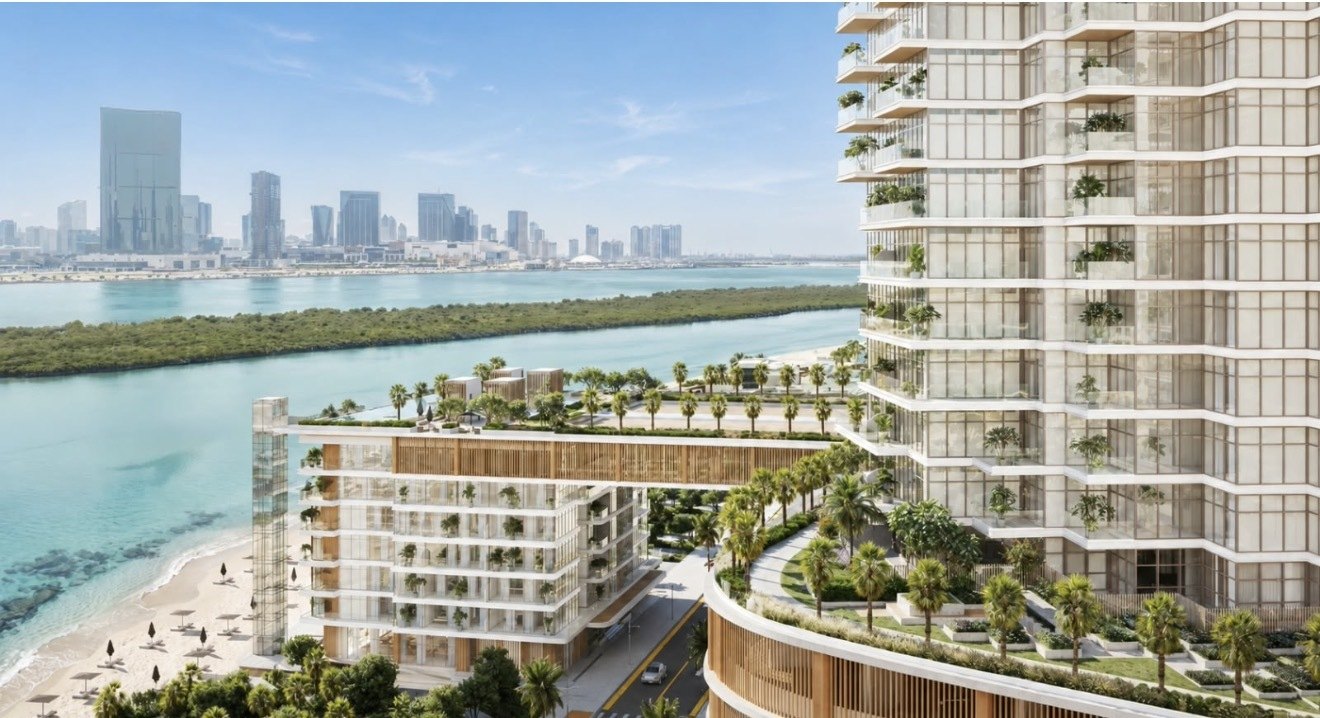Residence 77 seen from the air, with the beach, the mangroves and the Abu Dhabi skyline behind