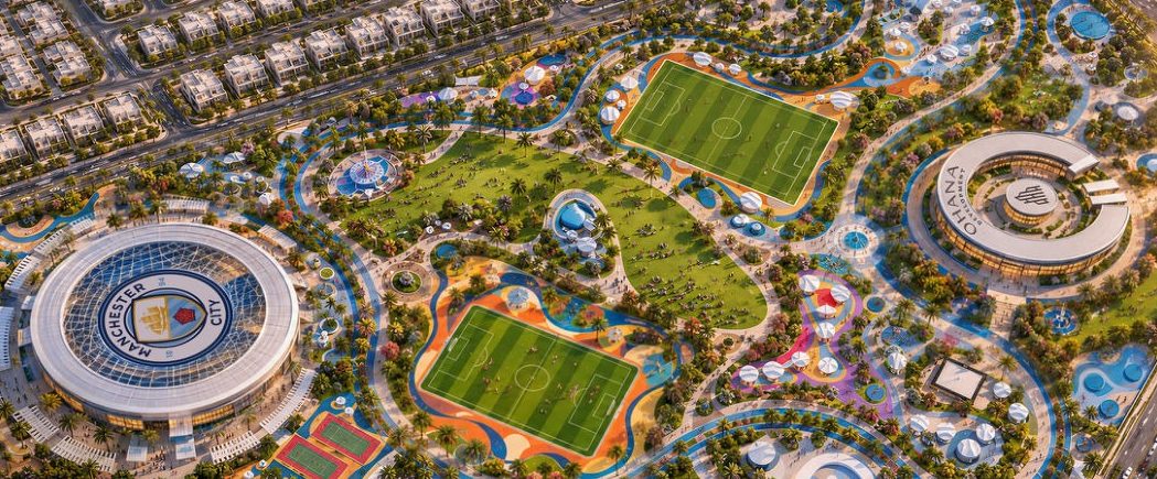 Aerial render of Manchester City Park with two football pitches, the arena, a clubhouse and winding paths through the gardens