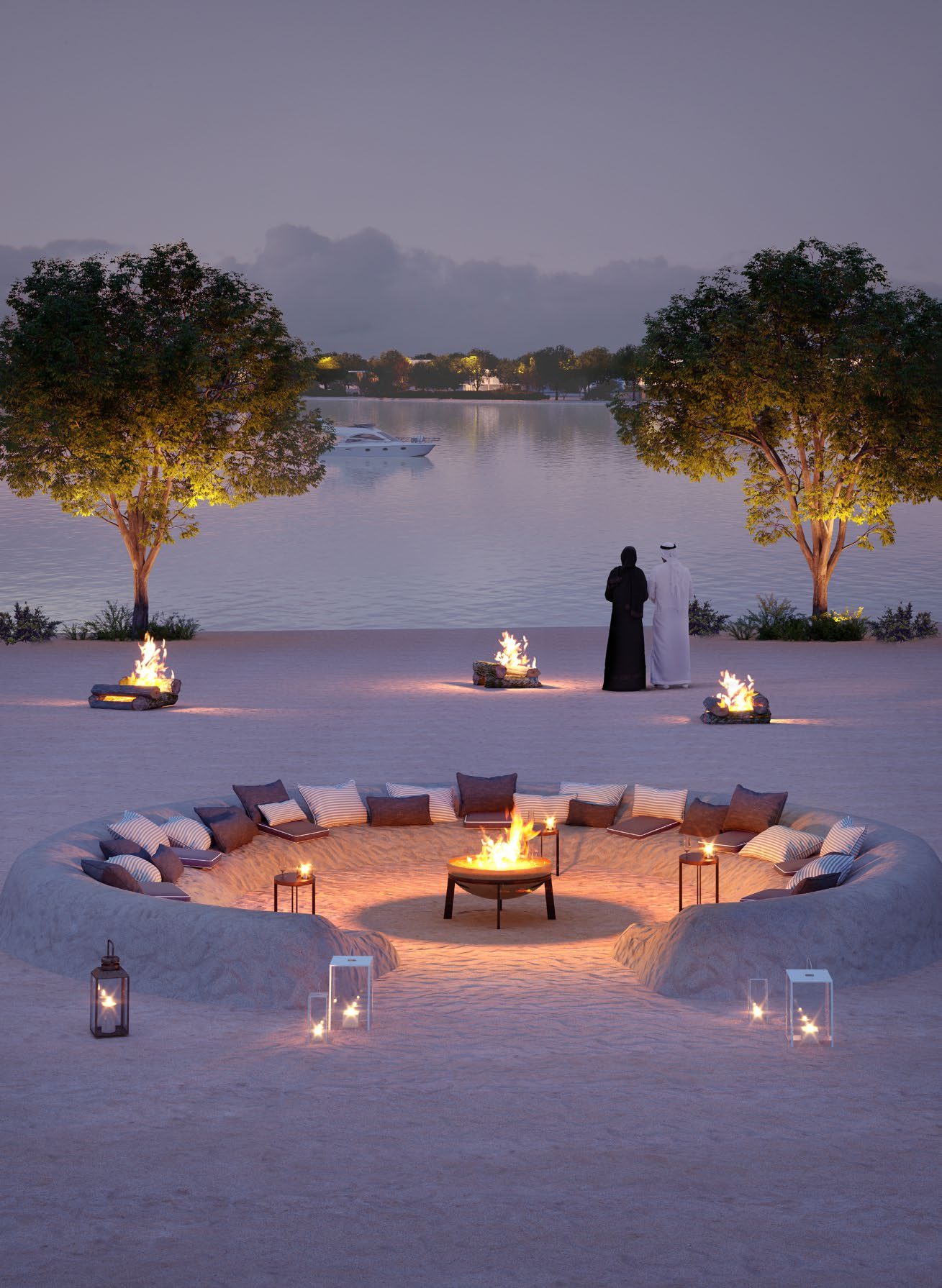 A sunken fire pit on the sand at dusk