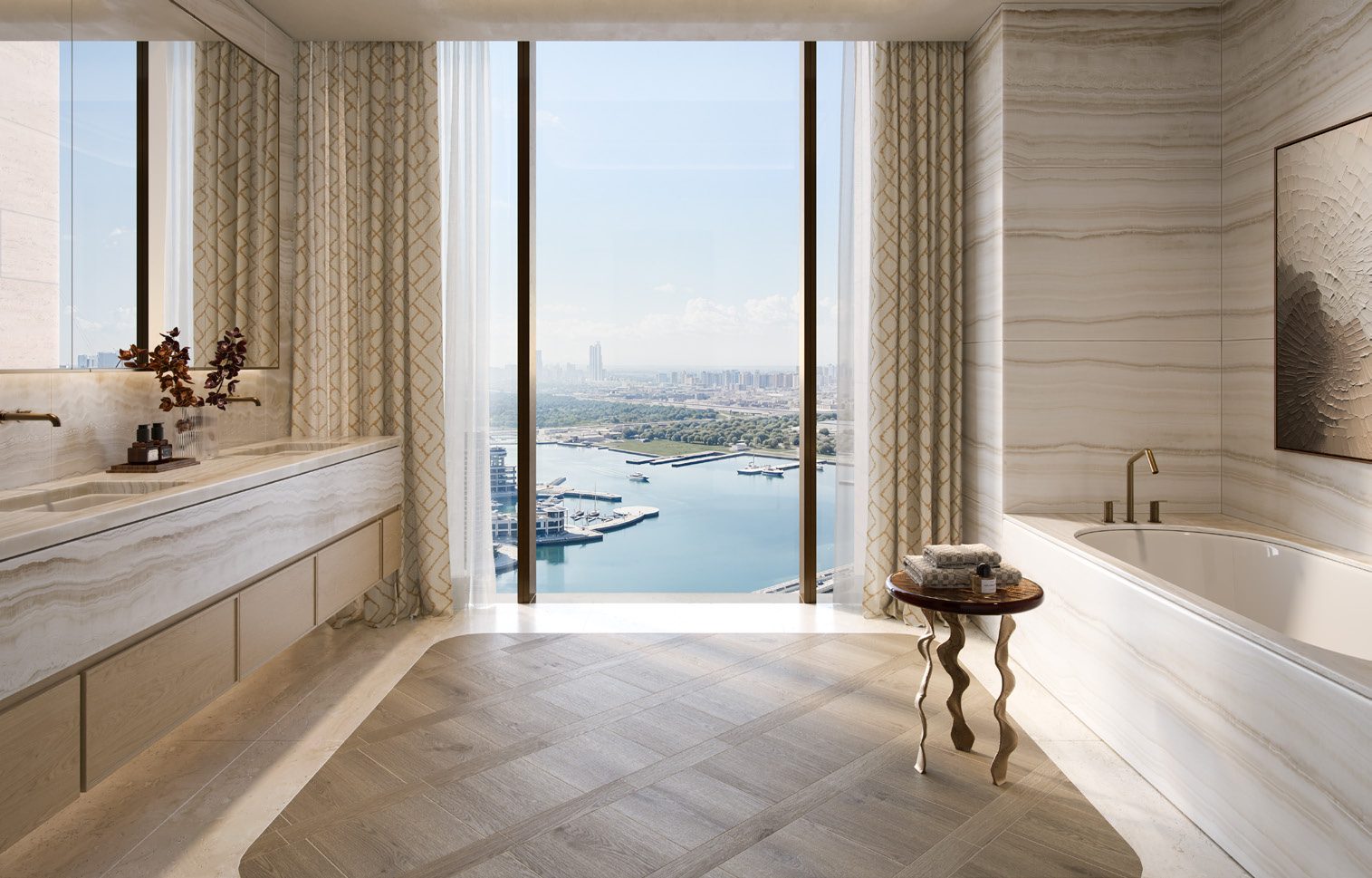 A master bathroom with a freestanding bath beside a full-height window overlooking the water