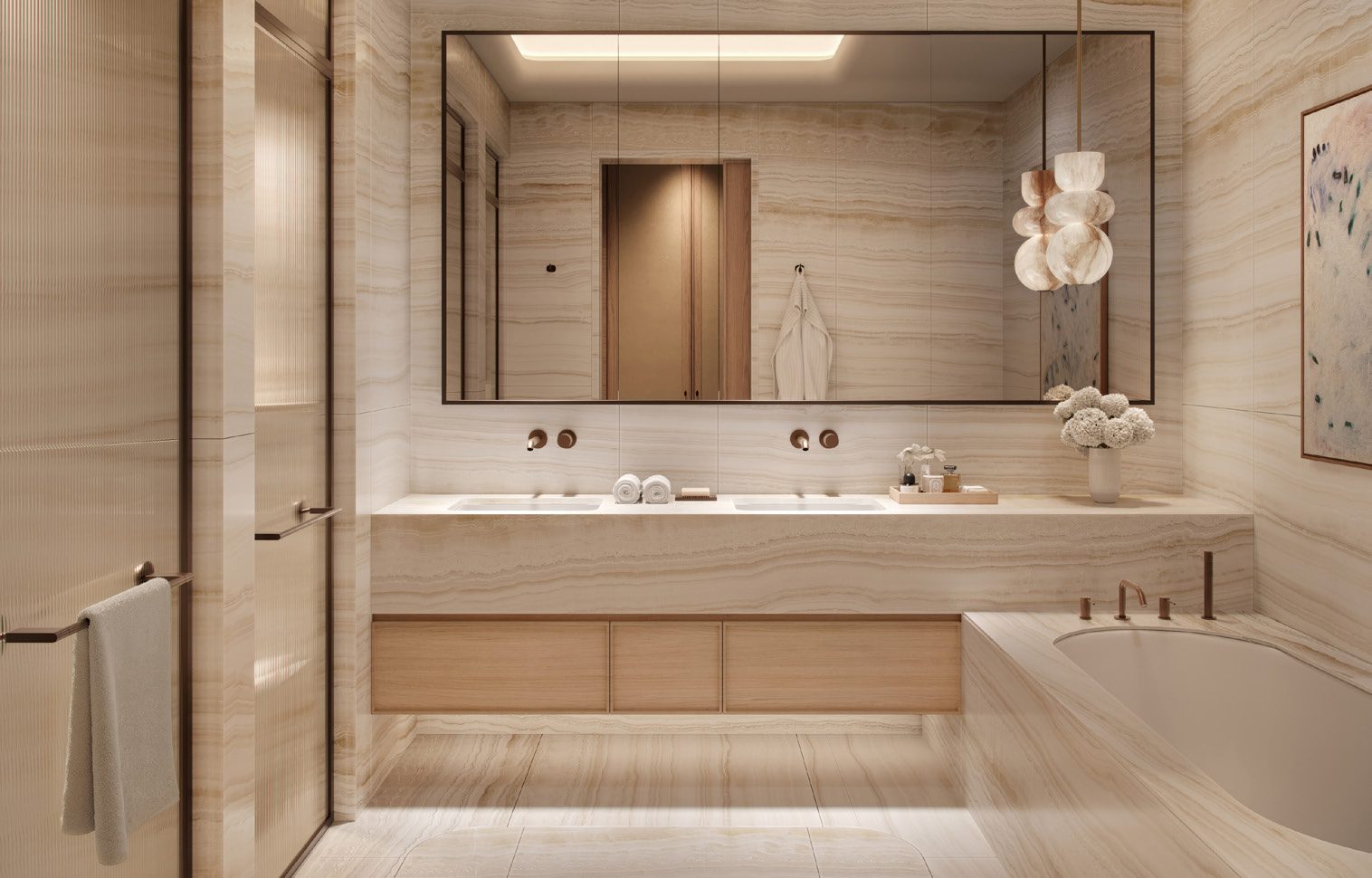 A marble-clad bathroom vanity with a wide mirror