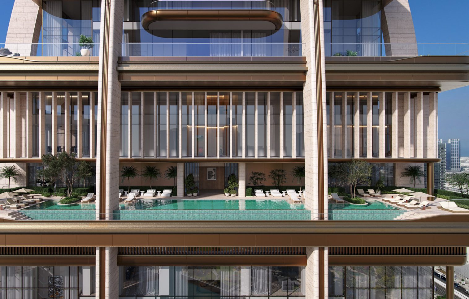 The outdoor pool deck with cabanas and loungers at the foot of the tower