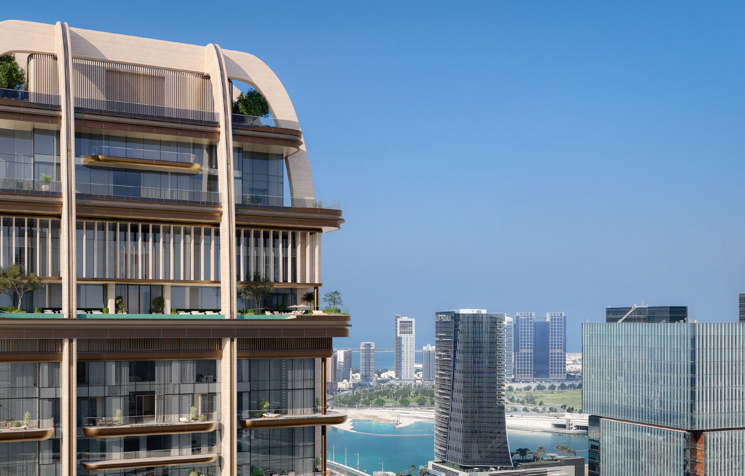 Deep terraces and vertical fins on the upper floors of The Ritz-Carlton Residences, with Al Reem Island in the distance