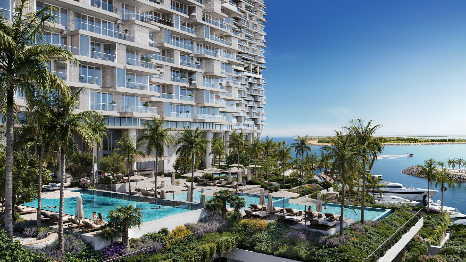 Planted podium terraces and pools at Riviera Residences