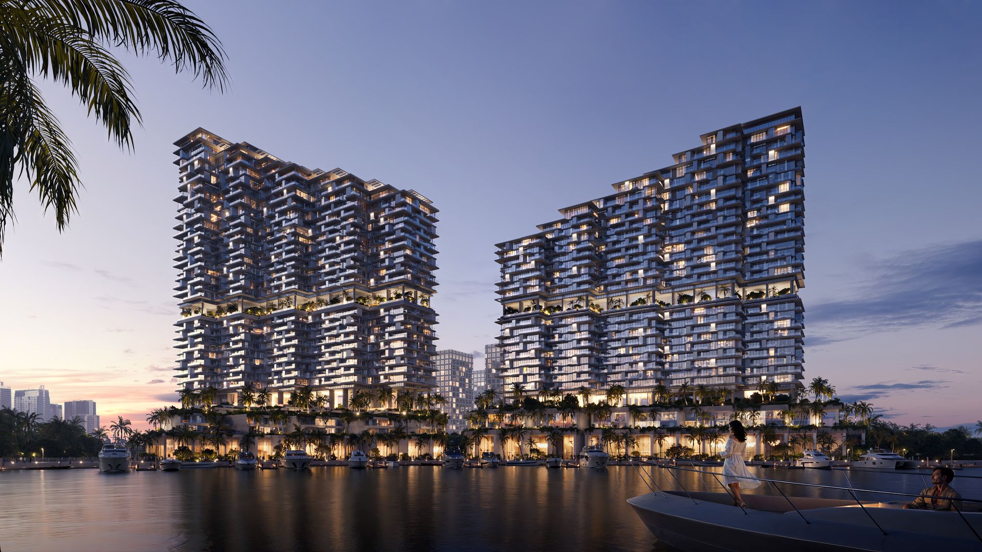 Riviera Residences seen across the water in the evening
