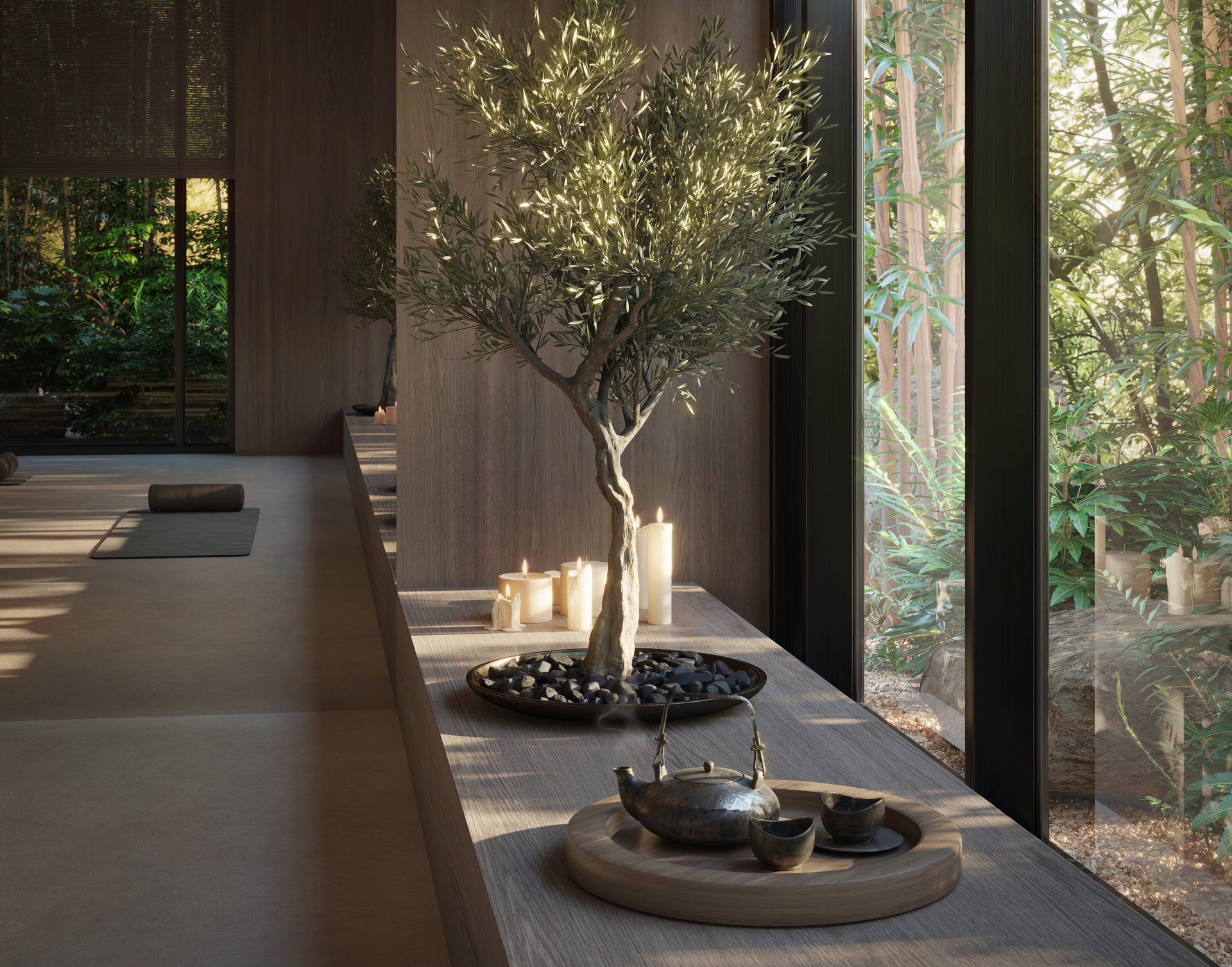 A quiet interior corner with an olive tree and candles