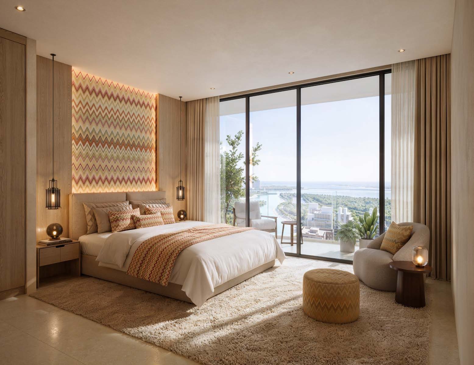 A master bedroom at Waterfront by Missoni with a Missoni zigzag headboard wall and a view over the canal