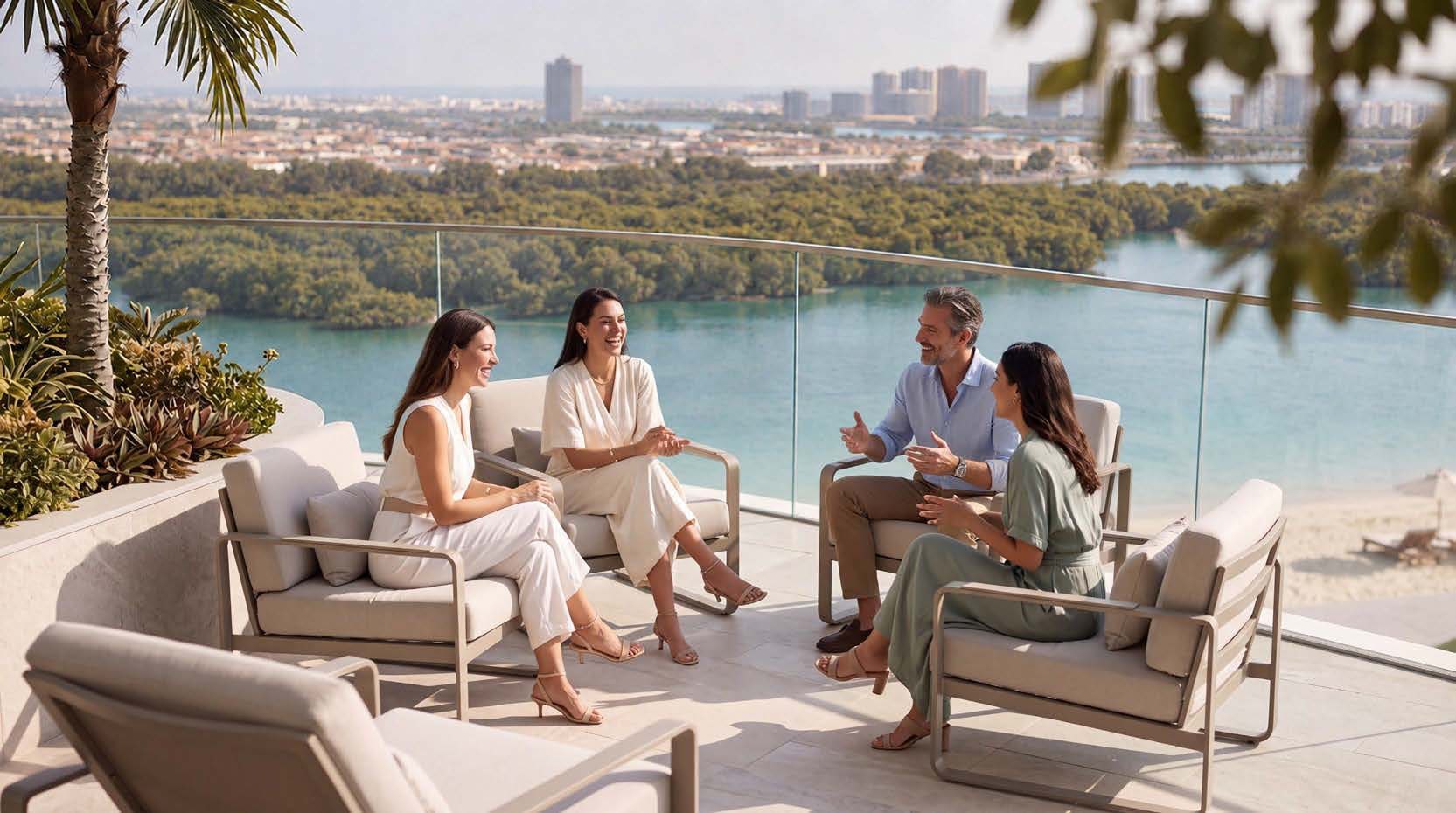 Residents on a podium terrace at Waterfront by Missoni overlooking the mangroves
