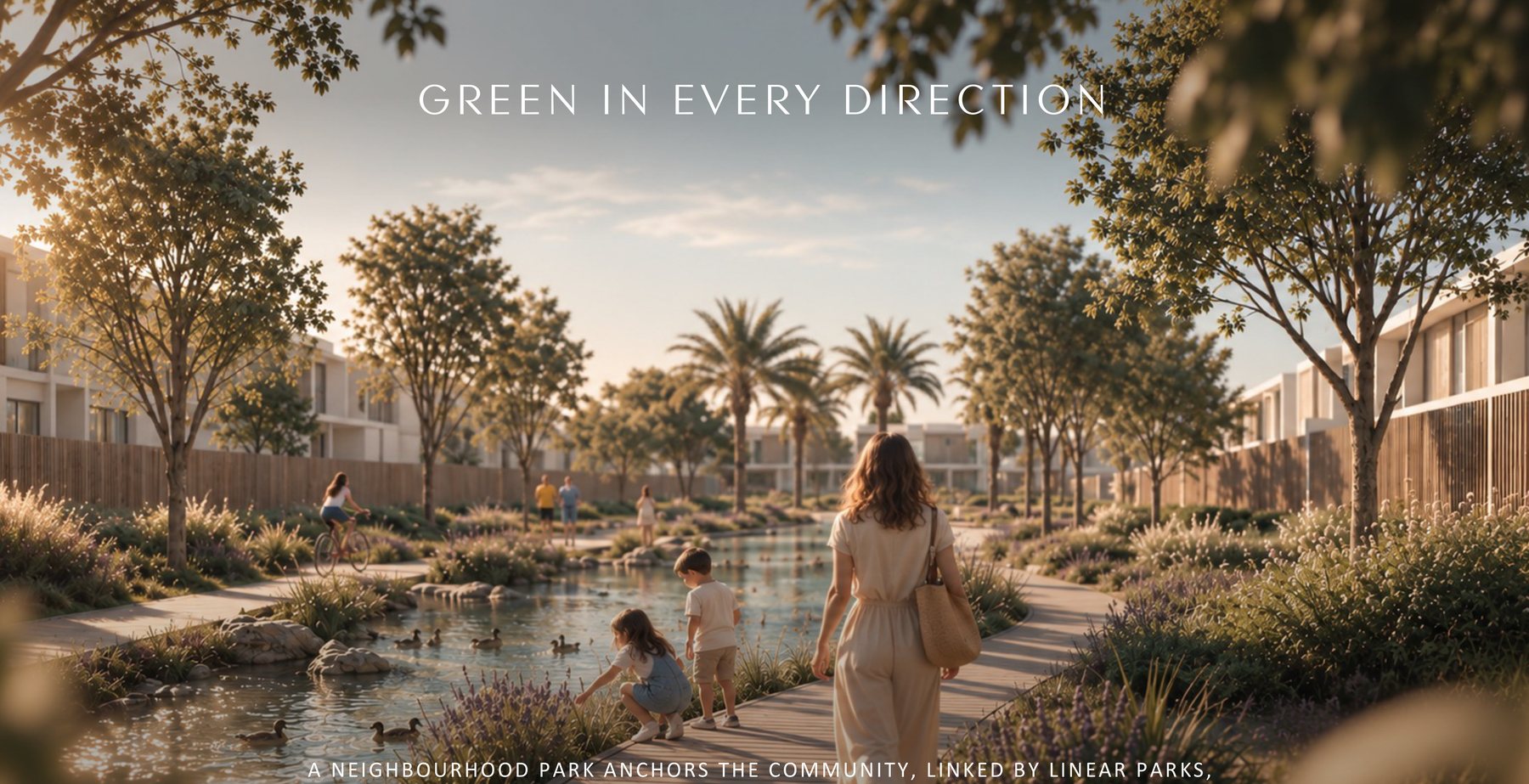 A neighbourhood park at Yas Riva Reserve with a water feature and mature planting